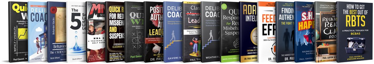 All 18 book covers by Dr. Paul Gavoni standing in a row on a shelf