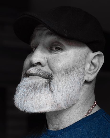 Dr. Paul "Paulie" Gavoni, portrait on a black background